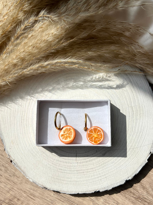 Orange slice charm earrings