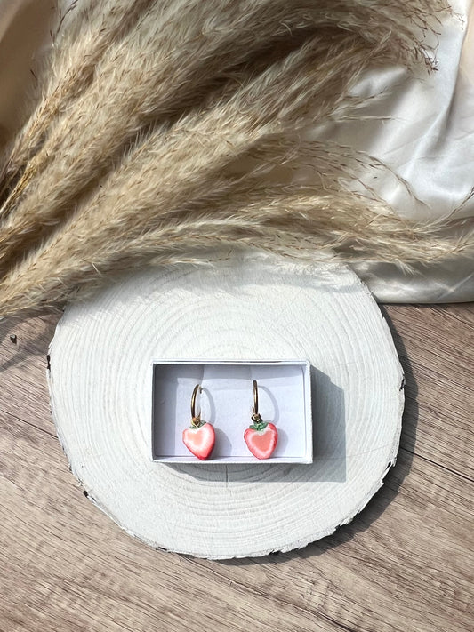 Half strawberry charm earrings