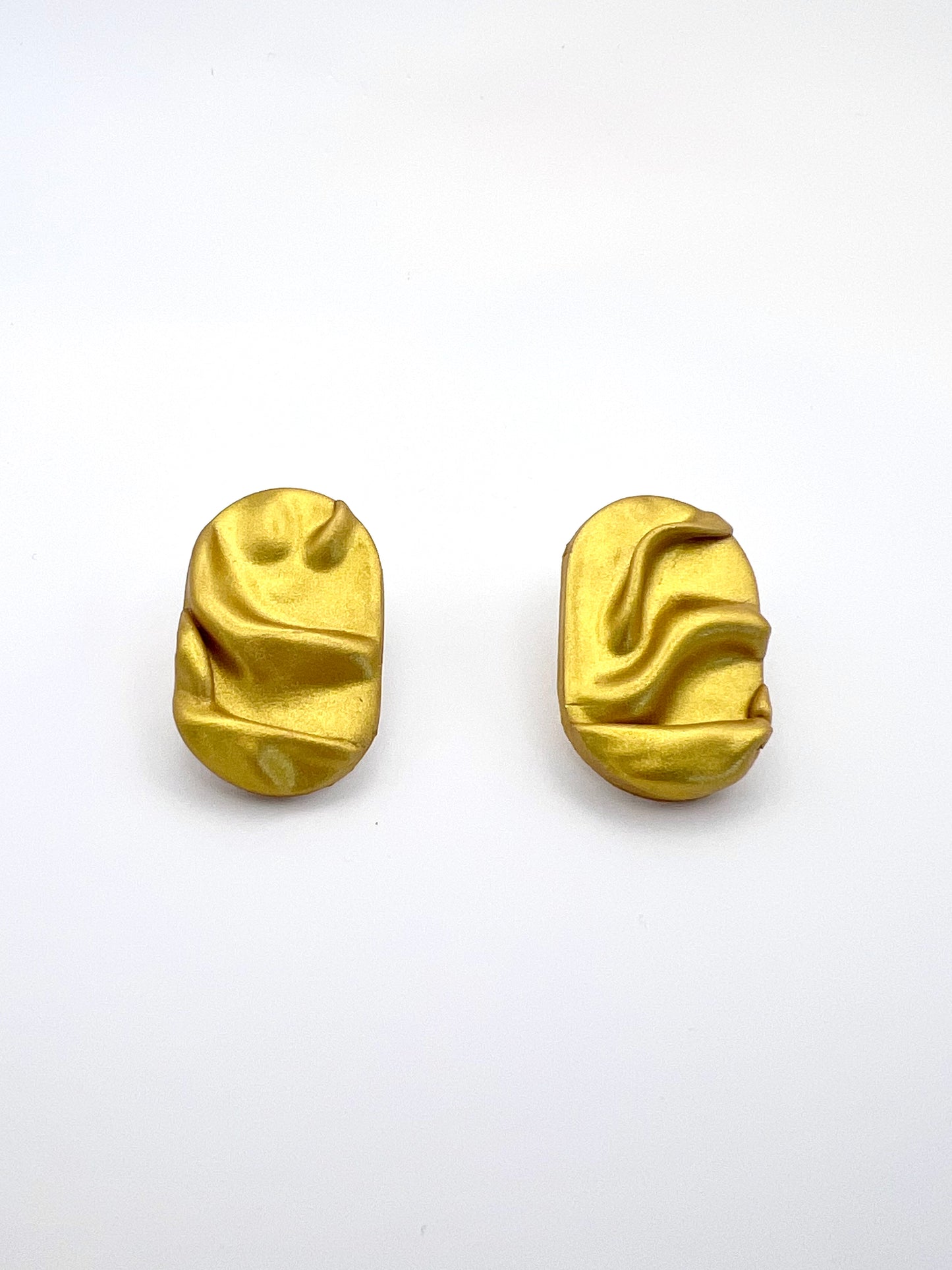 Draped stud pill earrings