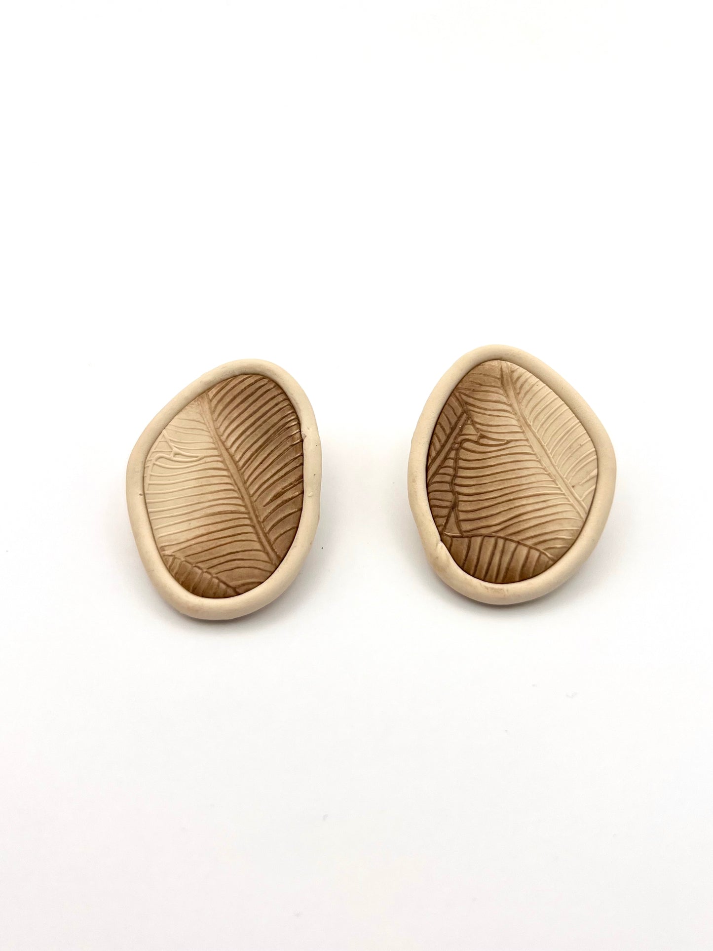 Large stud irregular earrings