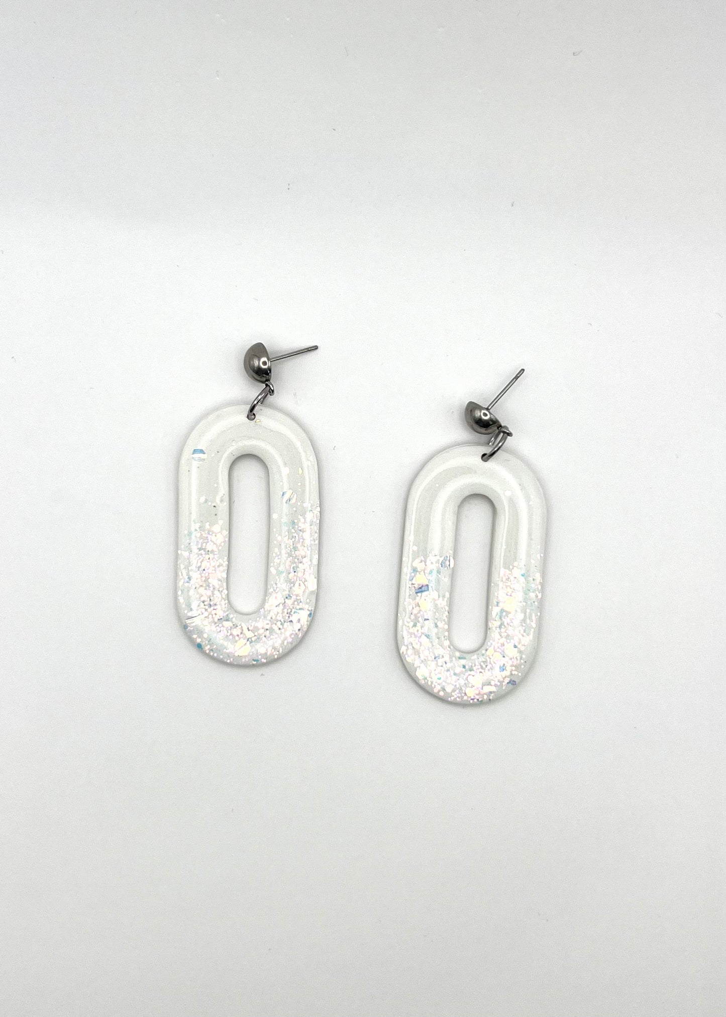 Nude pill shape earrings