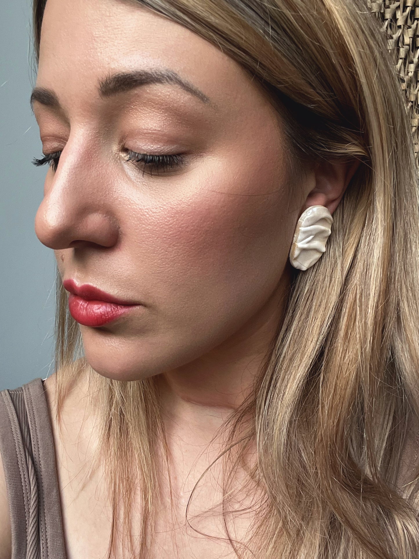 Draped stud pill earrings