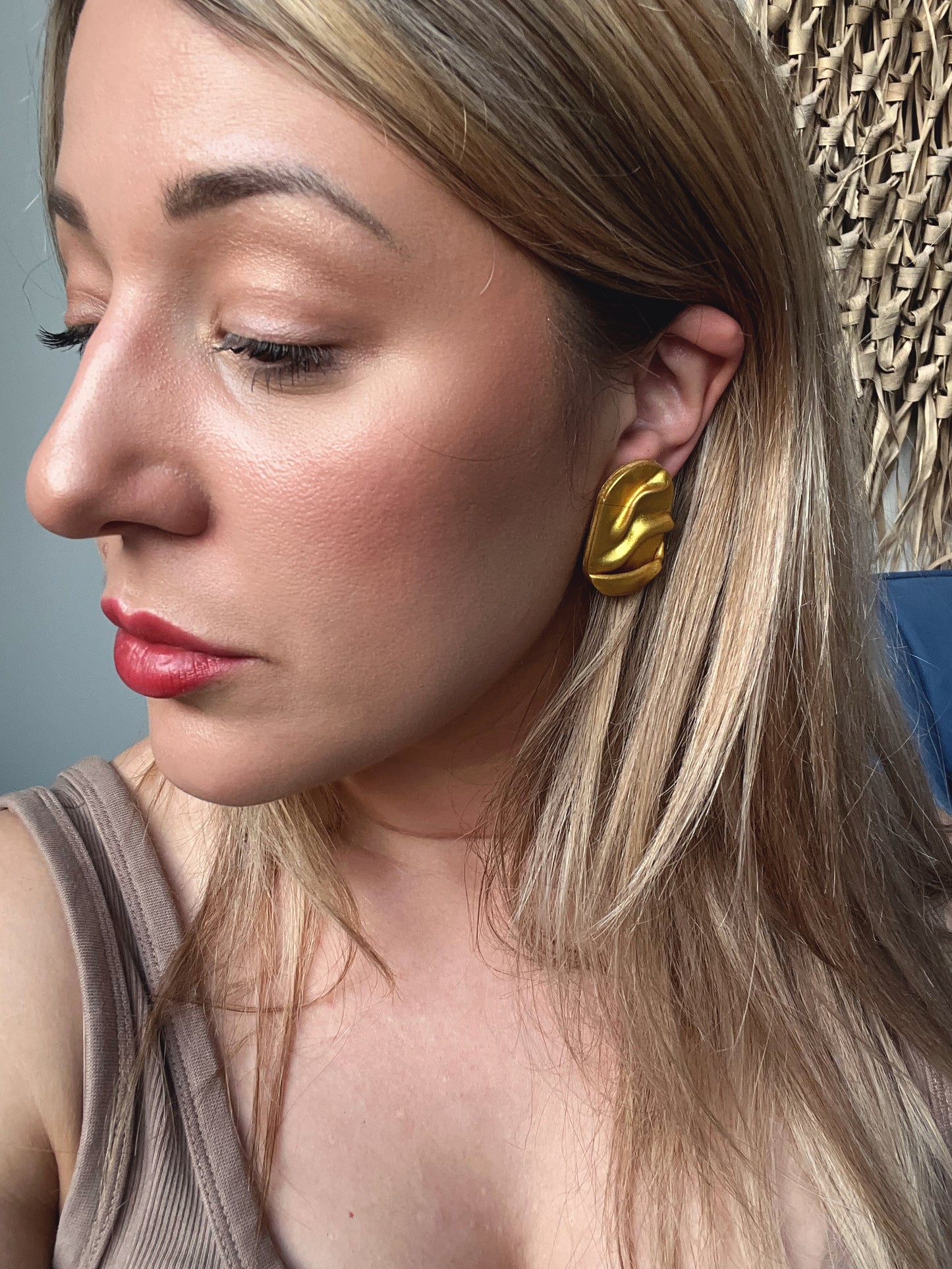 Draped stud pill earrings