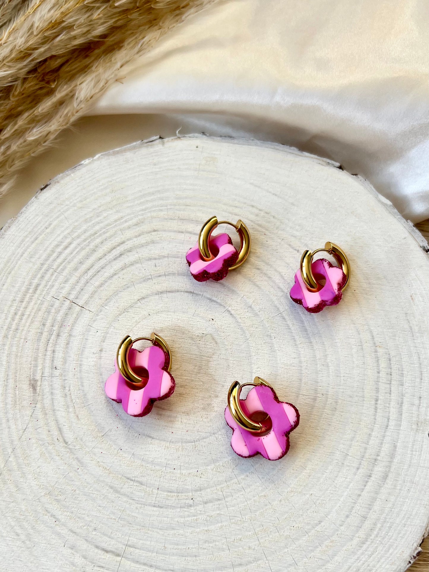 Pink stripe flowers on chunky huggie hoop